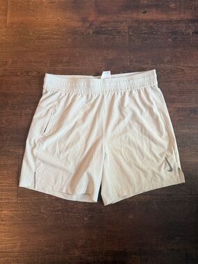 Nike Men’s Light Beige Athletic Shorts with Swoosh